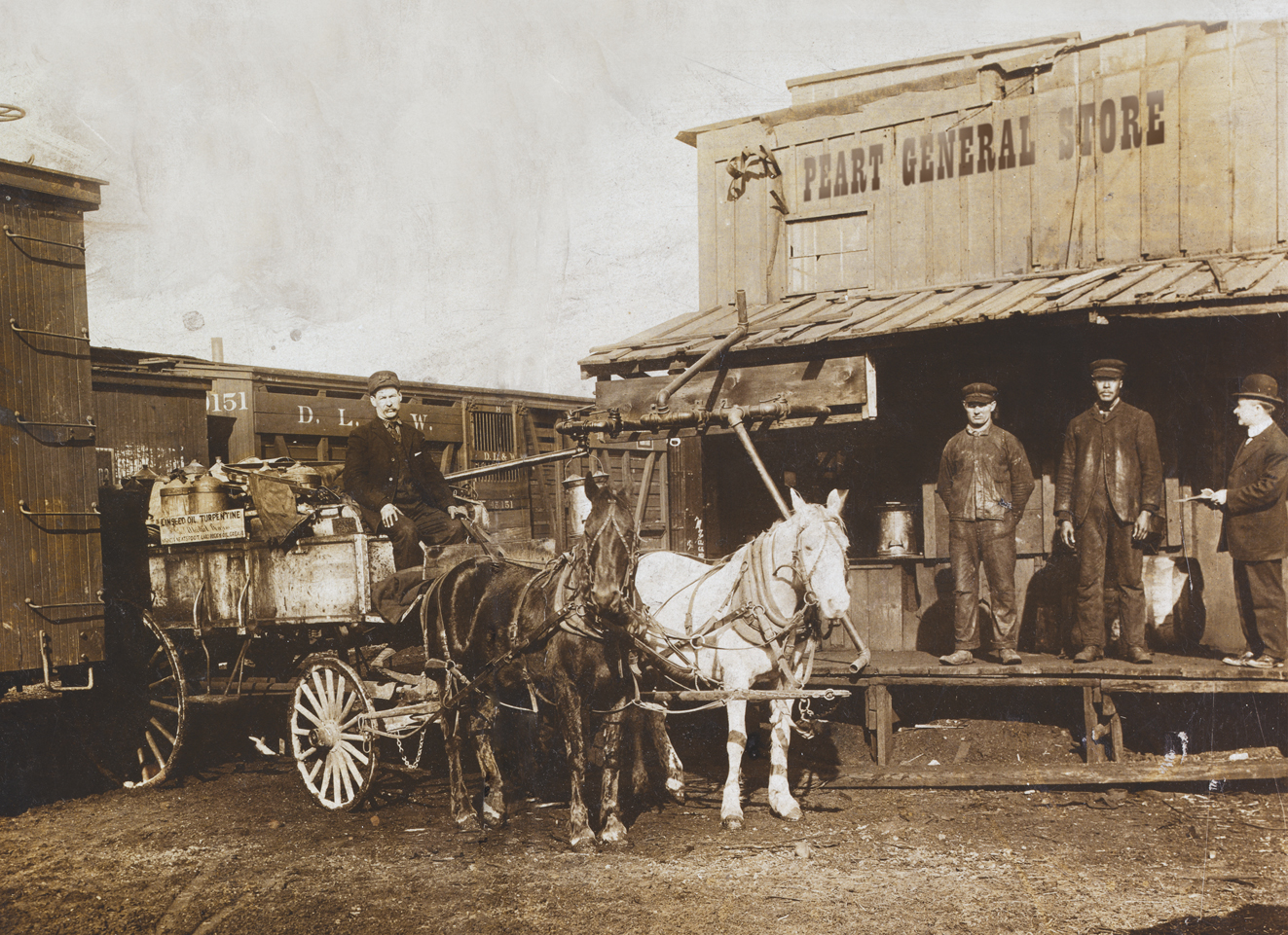 Henry Lueders sells his  wares from a horse-drawn  carriage on the Northside  of Chicago
